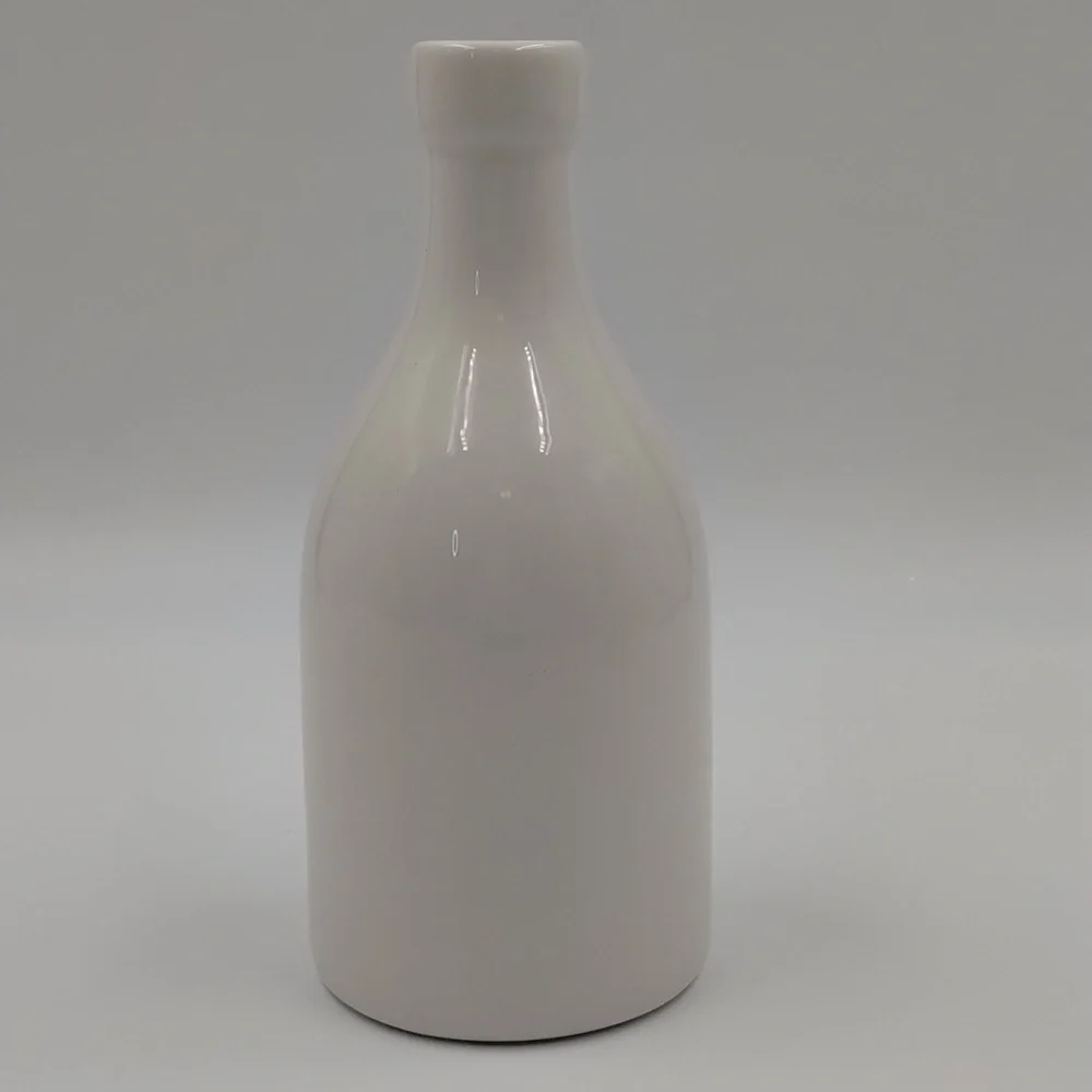 Orly Maison Oil 12 ounce ceramic container